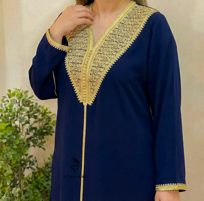 Navy blue kurta with gold embroidery on a neutral background